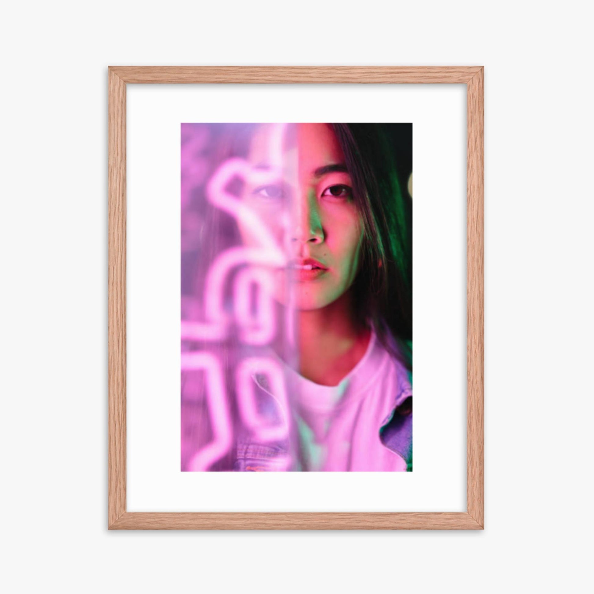 Portrait of young woman lit by pink neon light 16x20 in Poster With Oak Frame