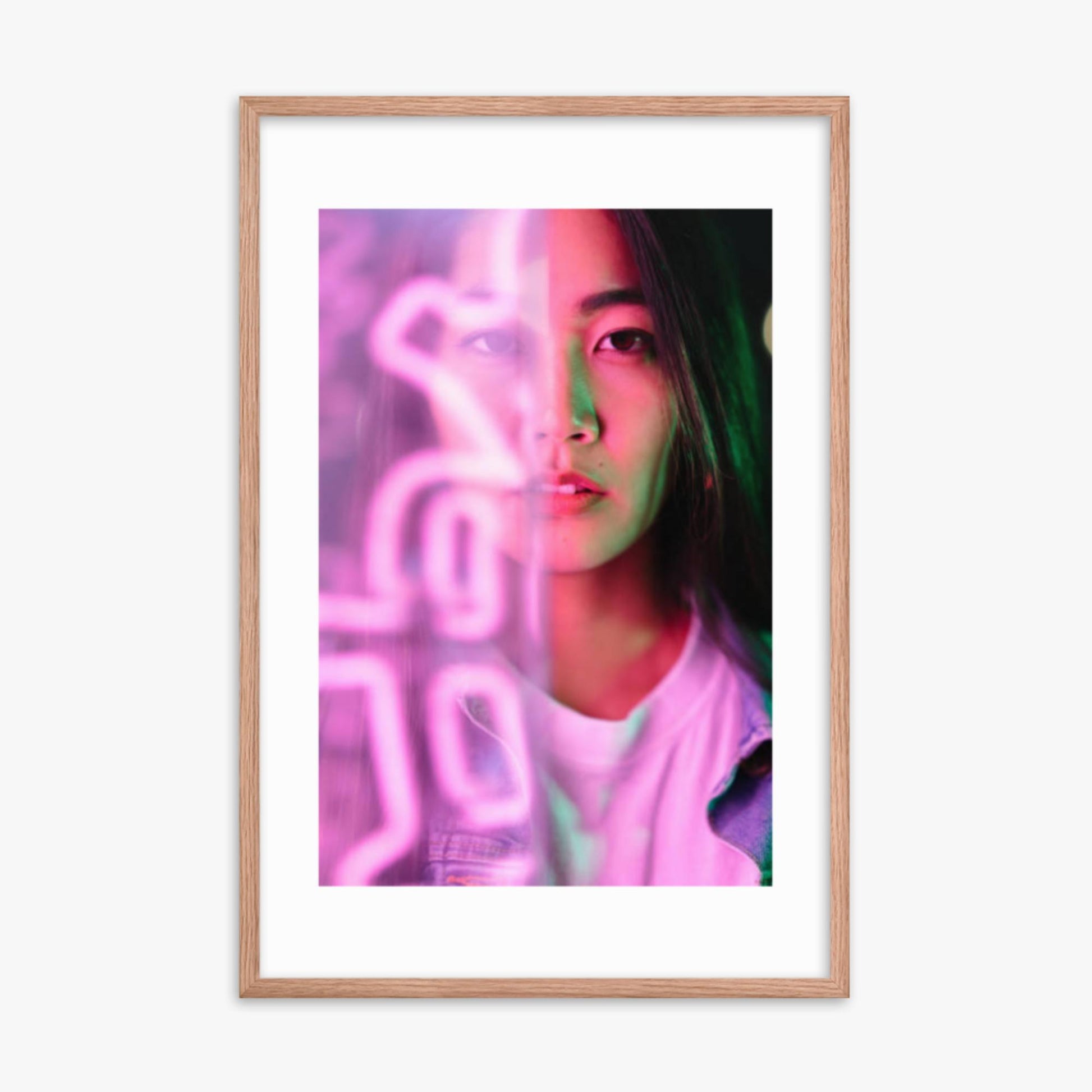 Portrait of young woman lit by pink neon light 24x36 in Poster With Oak Frame