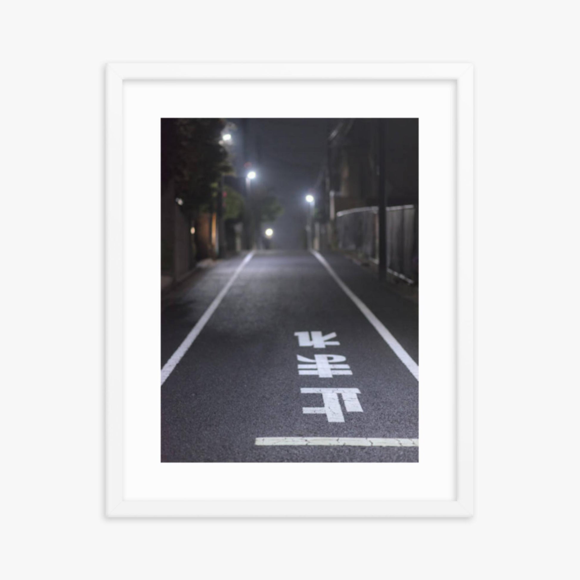 Typical road by night with the stop sign in Japanese written on the ground 16x20 in Poster With White Frame