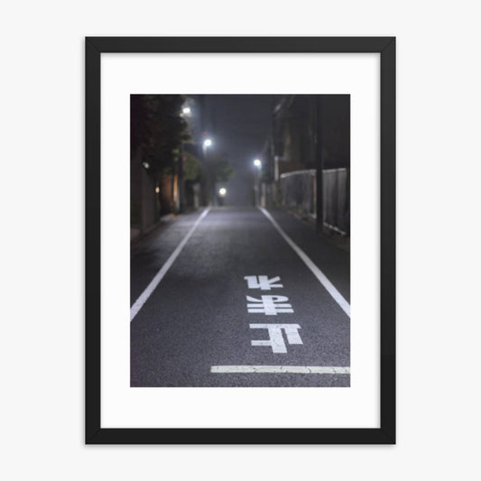 Typical road by night with the stop sign in Japanese written on the ground 18x24 in Poster With Black Frame